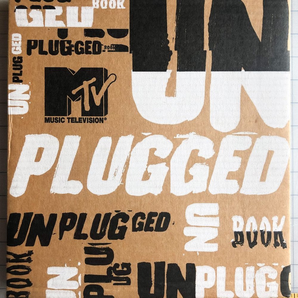 "MTV Unplugged" Spiral bound guitar body shaped book. 1st Edition & Numbered NEW